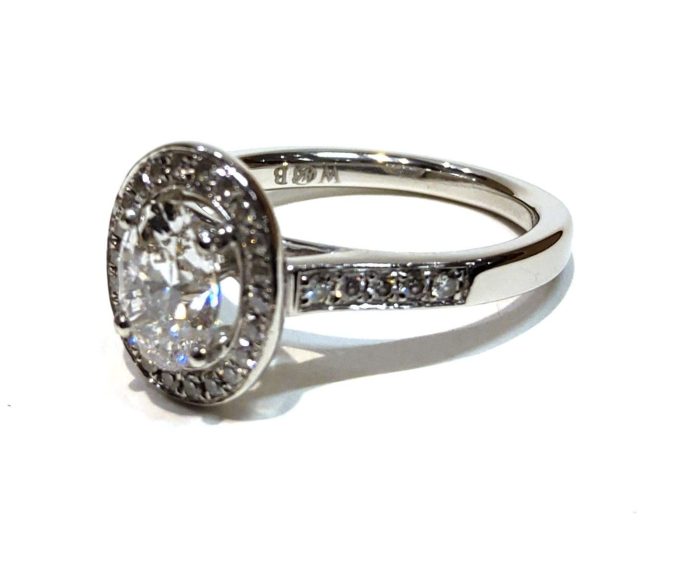 Oval Diamond Halo Platinum Solitaire Ring