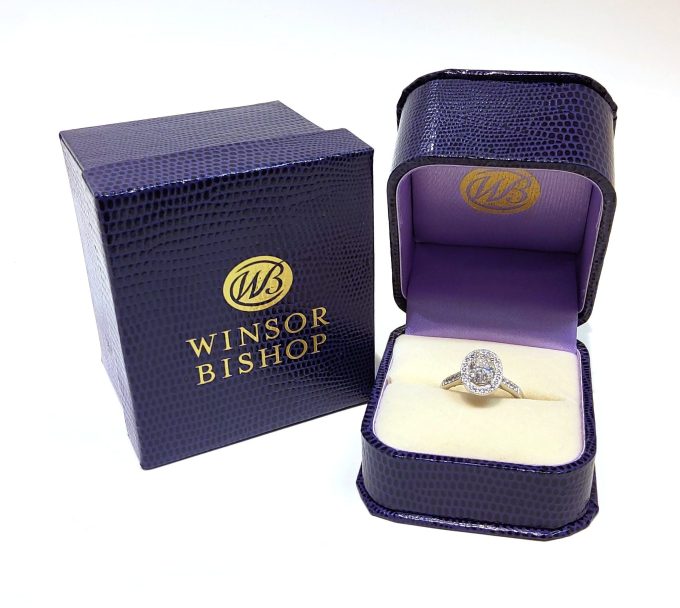 Oval Diamond Halo Platinum Solitaire Ring