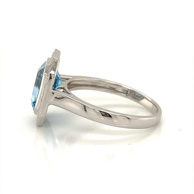 Blue Topaz and Diamond Ring